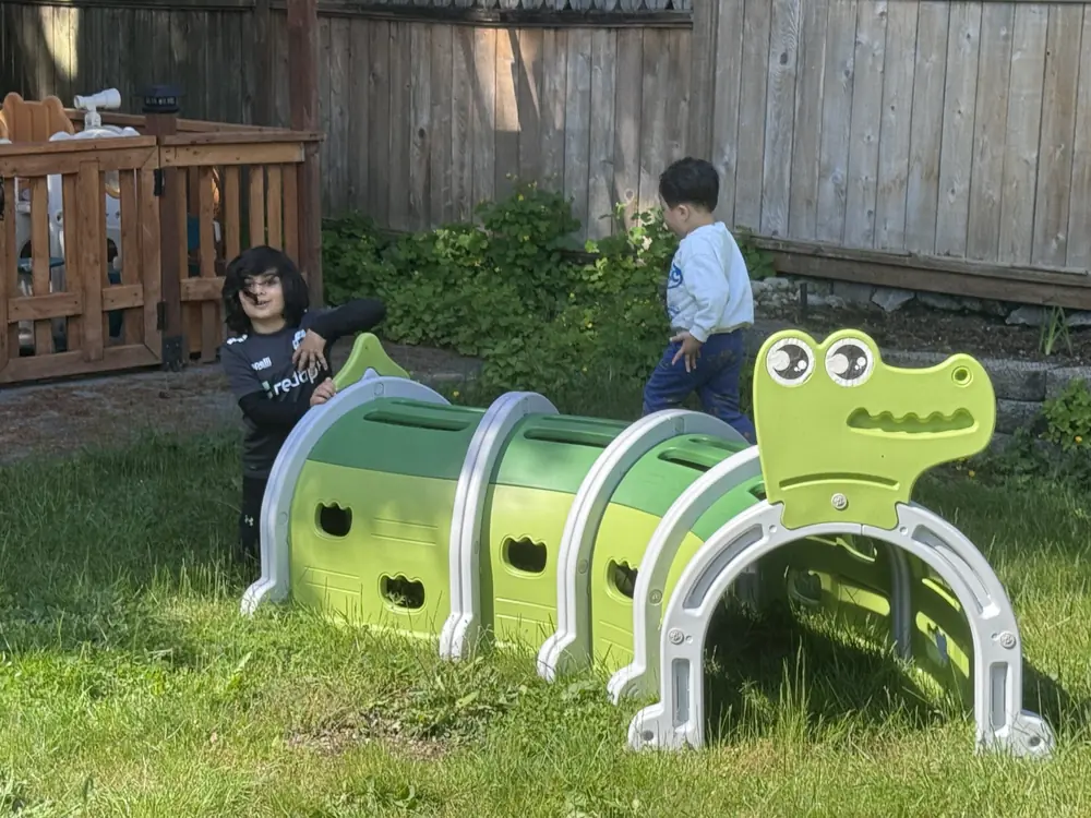 Kids exploring nature outdoors at daycare