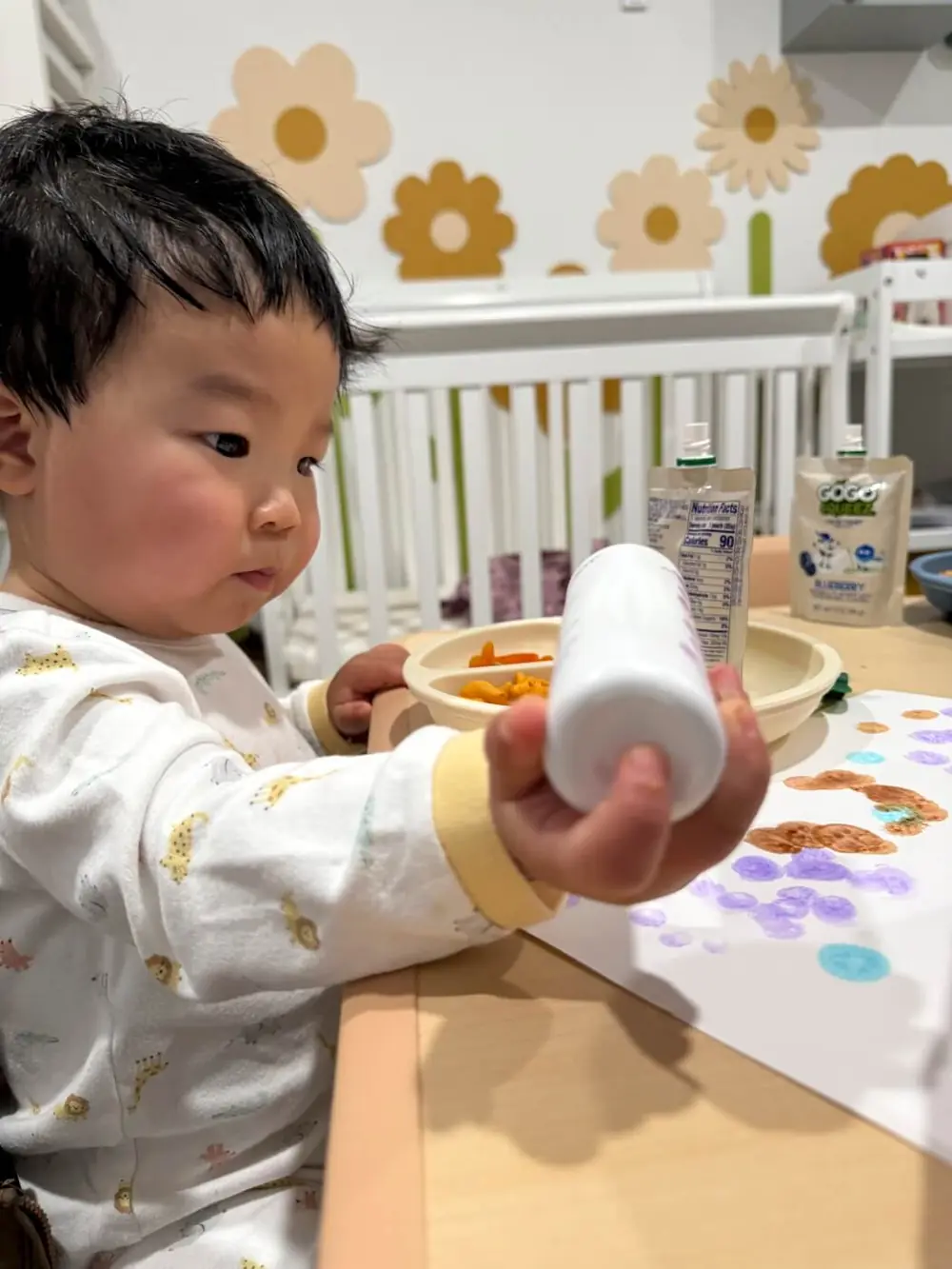 Child transitioning calmly between daycare activities
